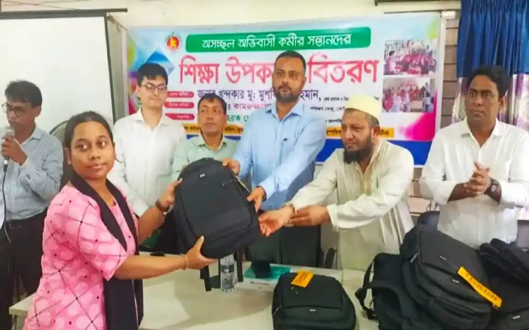 Distribution of educational materials among children of migrant workers in Cumilla