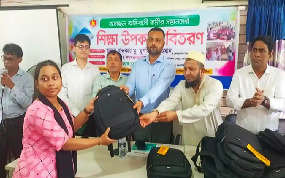 Distribution of educational materials among children of migrant workers in Cumilla