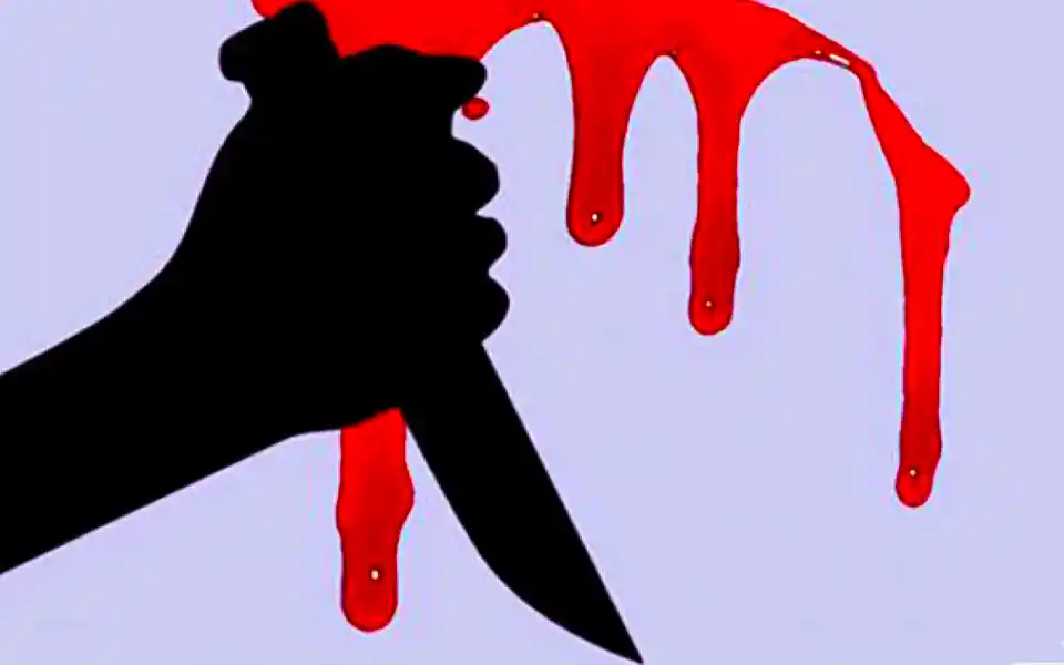 The husband's hands and feet were tied and he was hacked to death in front of his wife