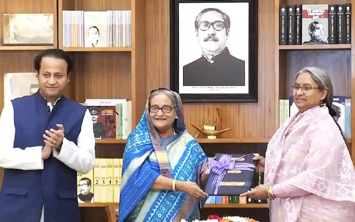 Handing over copy of HSC result to Prime Minister