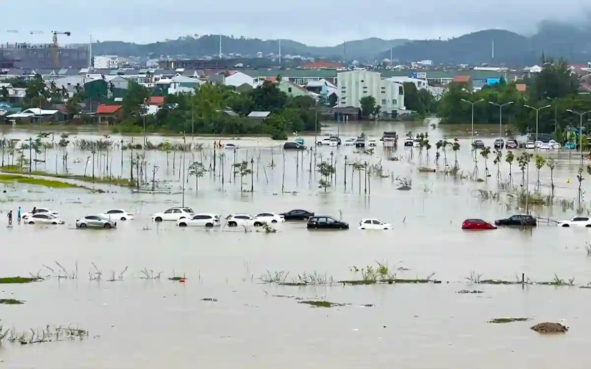 Heavy floods in Vietnam have submerged houses, blocked traffic