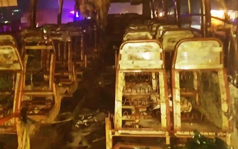 A bus standing on the side of the road caught fire at Debidwar in Cumilla