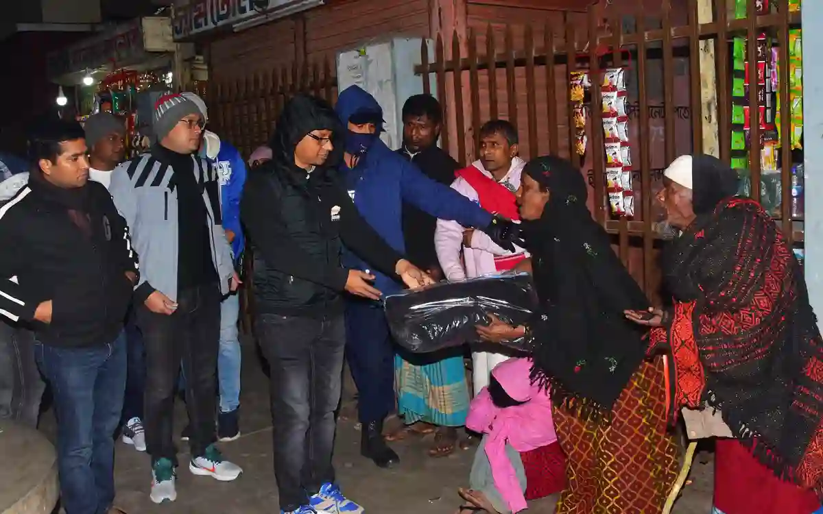 Distribution of winter clothes by the district police among the winter victims in Cumilla
