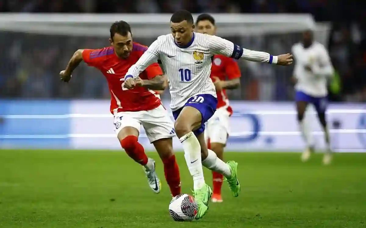 France bounced back from Germany's disappointment with a win over Chile