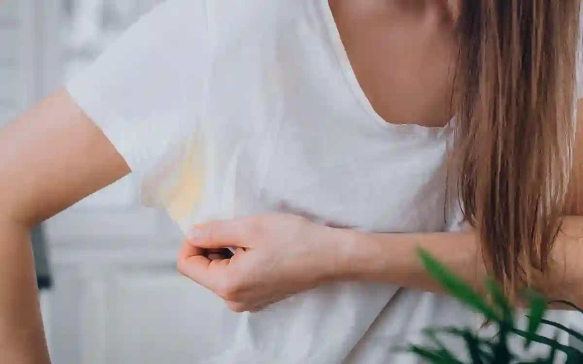 remove sweat stains from clothes