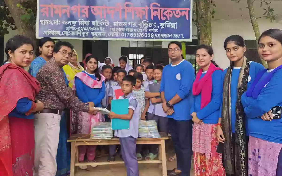 Rising Cumilla.Com - Distribution of educational materials among flood affected students under the initiative of Cumilla Purbasha and Madhumita Kachi-Kachha Mela