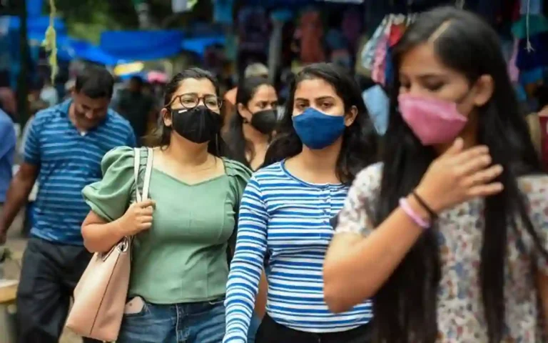 RisingCumilla.Com - Indian woman wearing face mask