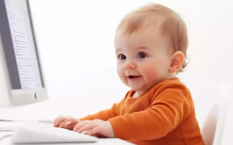 Rising Cumilla - baby using Computer