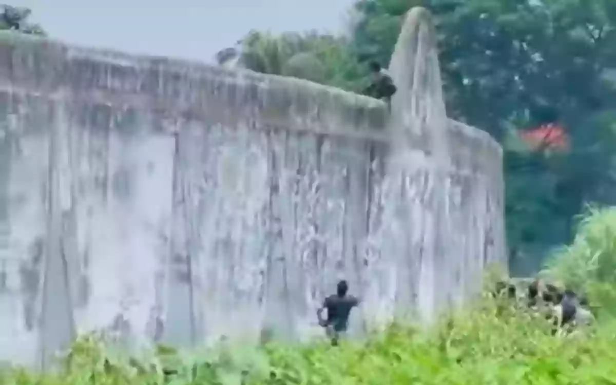 Prisoner attempts to escape by climbing over prison wall, video goes viral