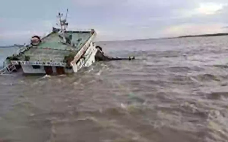 Trawler loaded with rods and cement sinks in Meghna River