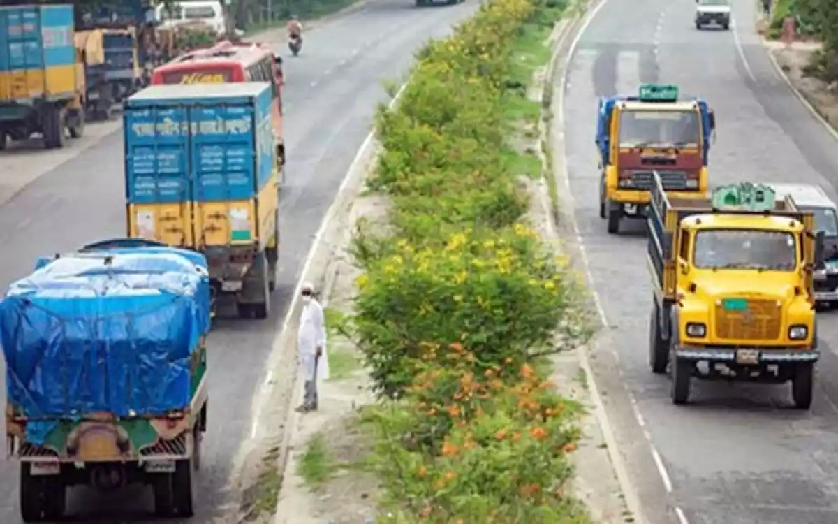 Trucks, covered vans on the highway