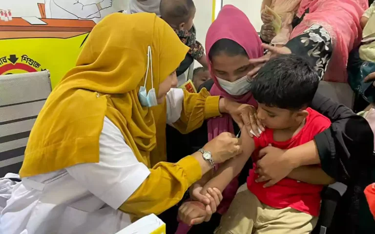 Rising Cumilla -Health worker giving vaccination