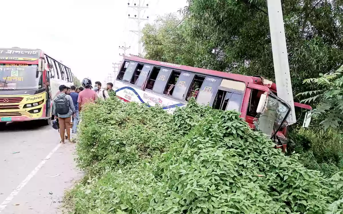 Rising Cumilla - Passenger bus falls into ditch while overtaking in Chandina, Cumilla.