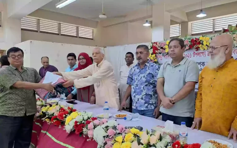 Rising Cumilla - Rice and sarees distributed at 65 pandals in Feni on the occasion of Sharadiya Durga Puja.