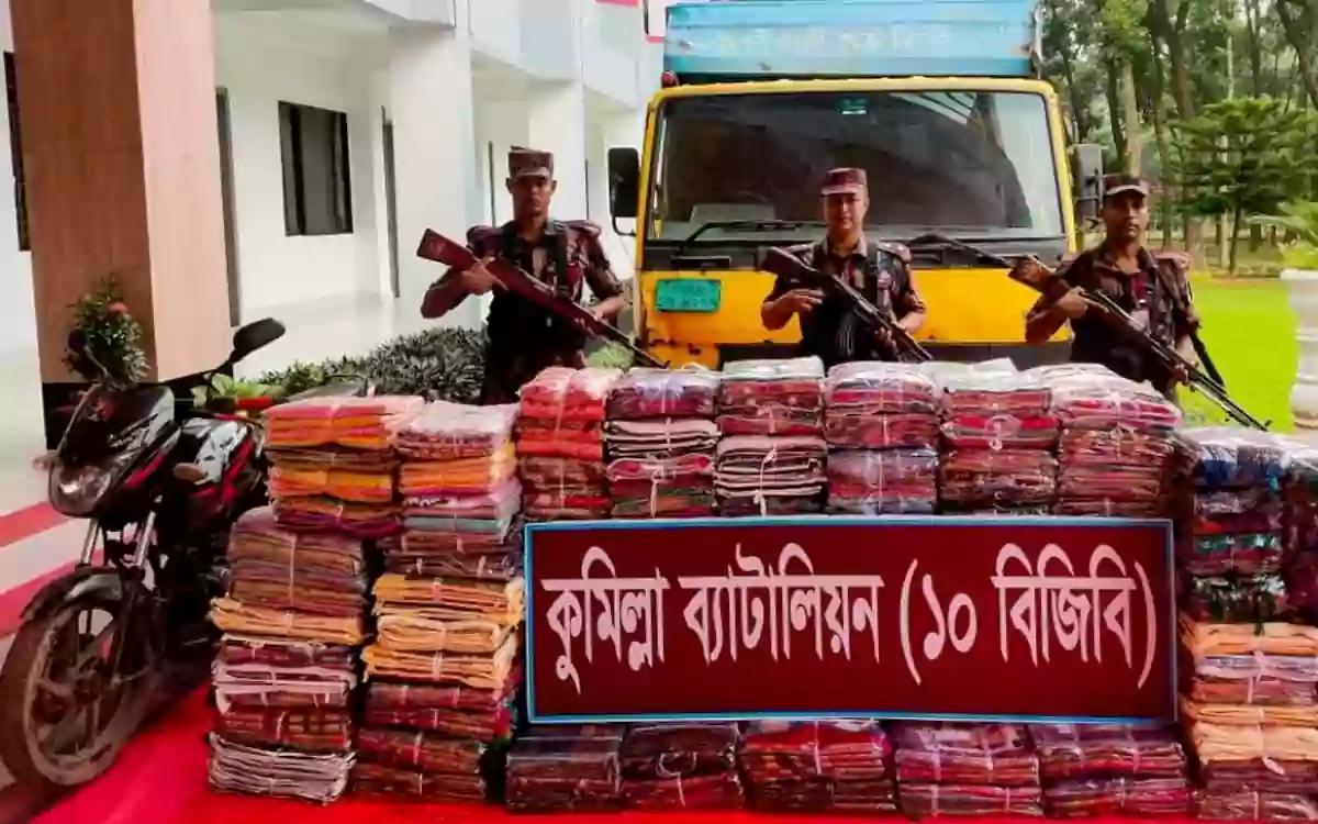 Rising Cumilla - Two vehicles seized along with a large quantity of Indian sarees and three-piece sets at the Feni border.